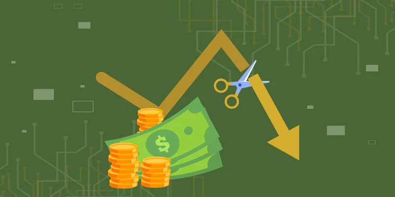 A downward financial graph with a pair of scissors cutting through, symbolizing low-risk investments and financial experimentation without pressure.